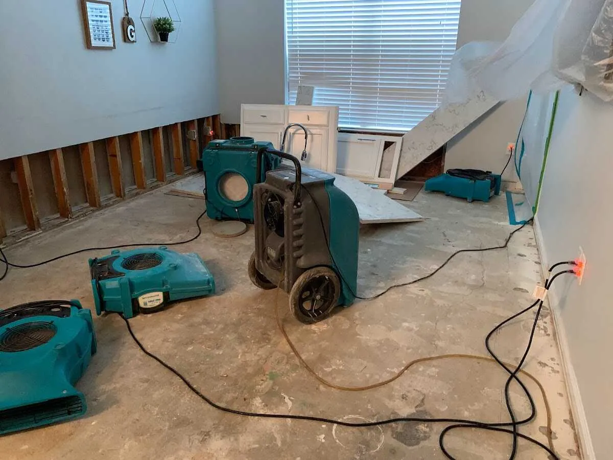 Dehumidifier in flood-cut room for Water Damage Restoration in Overland