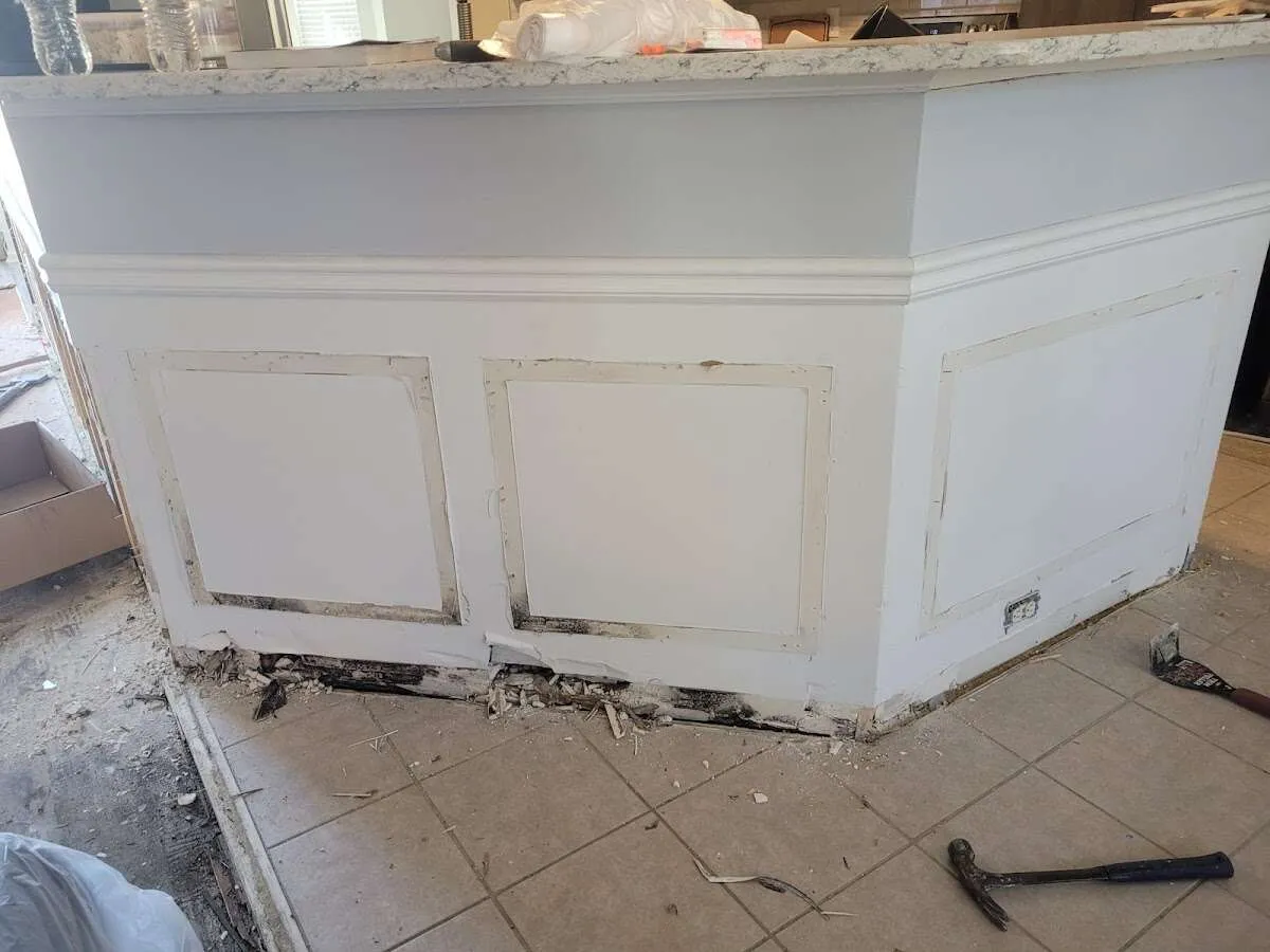 Water damage and mold on kitchen during Storm Damage Restoration in Overland